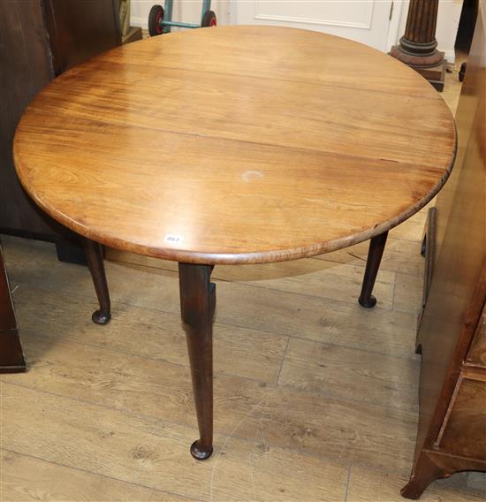 A George III mahogany oval topped pad foot drop leaf dining table 118cm extended